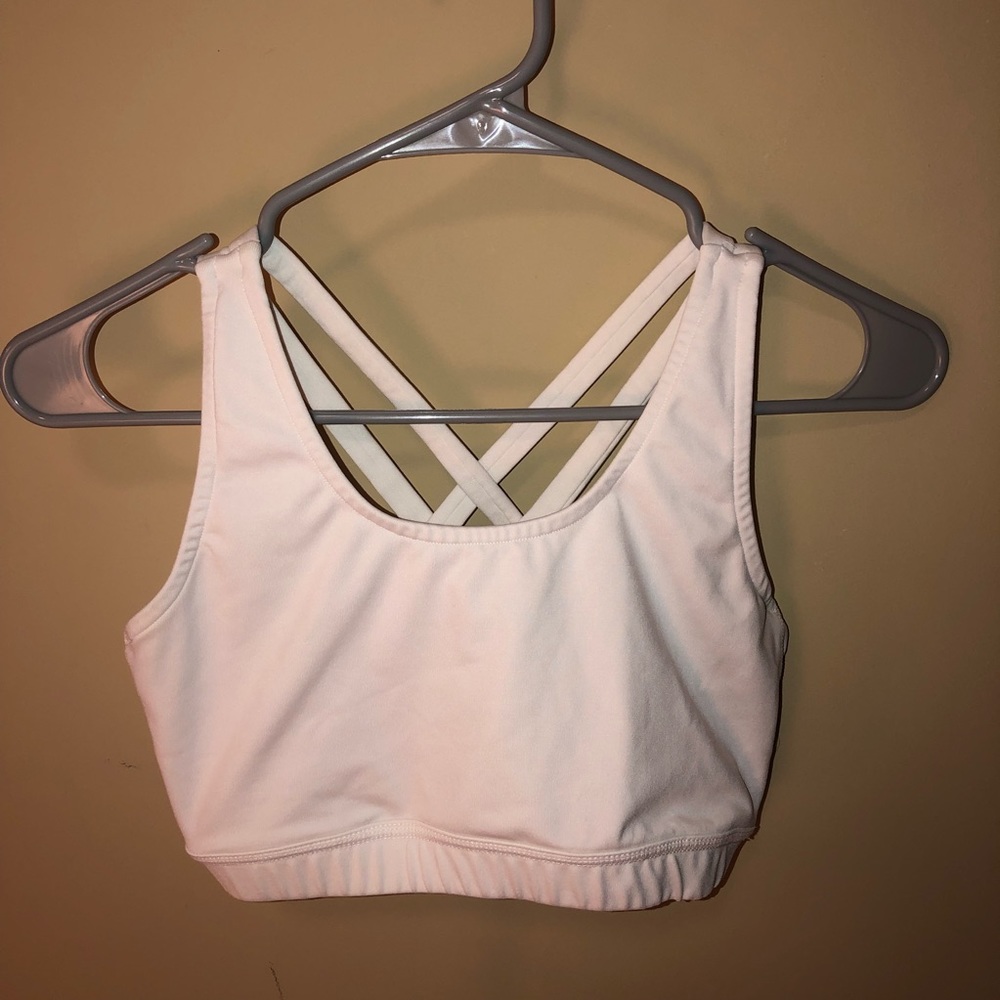 White Varsity cheerleading sports bra